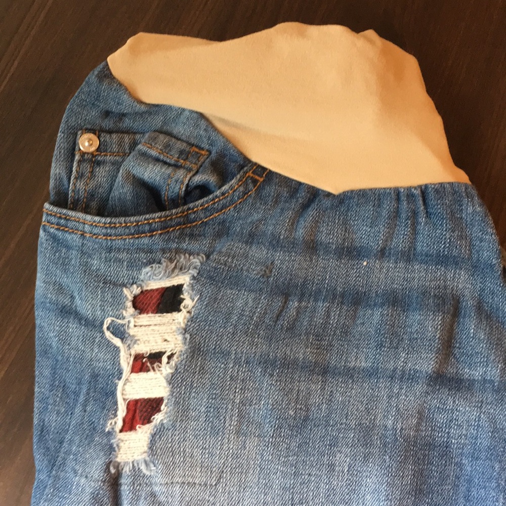 Maternity jeans with buffalo plaid in distresses